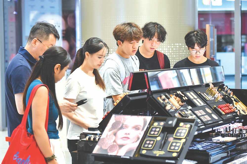 大陸公布第三季GDP增長數據優於預期。圖/中新社 image